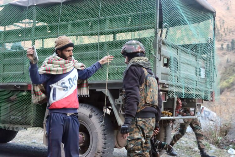 Poonch, Dec 25 (ANI): Security personnel check a man ahead of Chief of Army Staff General Manoj Pande's visit to review the security situation after the terrorist attack on an army vehicle, in Poonch on Monday. (ANI Photo)