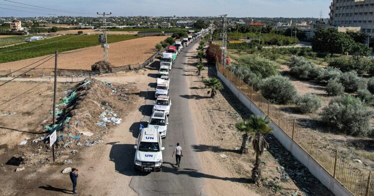 Israel Expedites Aid to Gaza with Dual Crossings: IDF Implements Enhanced Screening (Belal Al Sabbagh/AFP)