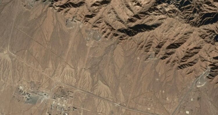 Satellite images recently published by The New York Times are raising concerns about the potential reactivation of China's Lop Nur nuclear test facility in the remote Xinjiang Autonomous Region. The images, analyzed by Dr. Renny Babiarz, a geospatial intelligence expert, suggest that China may be gearing up for full-fledged nuclear tests or subcritical nuclear explosions, which simulate nuclear blasts using chemical explosives. The timing of this activity is particularly sensitive amid strained U.S.-China relations. President Biden, aiming to stabilize the relationship, recently met with China's leader, Xi Jinping, seeking common ground. However, China has dismissed the report, stating it is baseless and an attempt to exaggerate a "China nuclear threat." The satellite images reveal a significant transformation of the Lop Nur facility over the past few years. The once modest site has evolved into a modern complex with enhanced security features, including a bunker designed for handling high explosives. The construction of a new airbase, multiple shafts into hill features, and a large drilling rig nearly 90 feet tall further underscore the facility's upgrade. Dr. Babiarz's analysis also points to the construction of a mini-township named Malan, believed to support activities at Lop Nur. The presence of a drilling rig identical to the one at Lop Nur suggests it may serve as a training site for shaft drillers. The images show China's commitment to expanding its rocket force, a crucial part of its nuclear triad. The Middlebury Institute of International Studies notes a radical expansion, projecting over 1,000 ballistic missile launchers, including 507 nuclear-capable launchers, by 2028. This shift in China's missile forces raises concerns about a departure from a previously restrained second-strike nuclear posture to one capable of deterring at multiple conflict levels. For Bharat, which declared a unilateral moratorium on nuclear testing after its 1998 tests in Pokhran, China's potential reactivation of Lop Nur poses a significant regional security threat. India, with a more modest nuclear arsenal, relies on computer simulations to predict the yields of any nuclear weapons designs. As tensions escalate, the international community closely monitors China's activities at Lop Nur, recognizing the potential global impact of any nuclear testing endeavors.