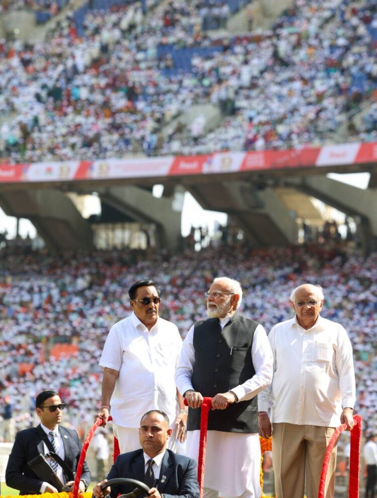 Ahmedabad, Feb 22 (ANI): Prime Minister Narendra Modi with Gujarat Chief Minister Bhupendra Patel and Bharatiya Janata Party (BJP) State Chief CR Patil during the Golden Jubilee celebrations of the Gujarat Cooperative Milk Marketing Federation, at Narendra Modi Stadium, in Ahmedabad on Thursday. (ANI Photo)