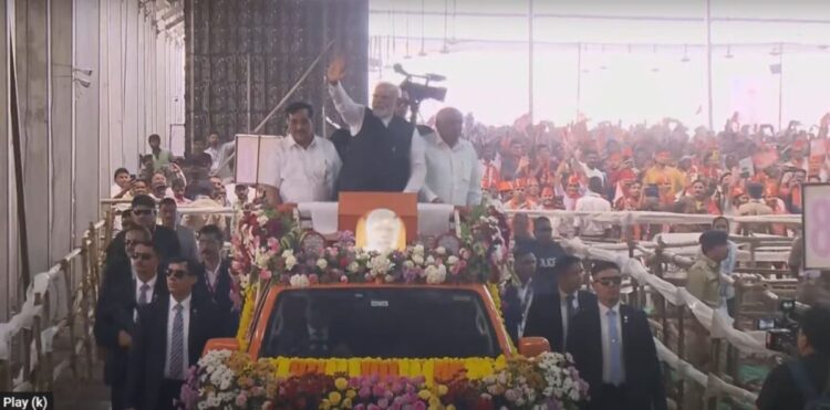 Prime Minister Narendra Modi who is on a visit to Gujarat held a mega roadshow in the state's Navsari district on Thursday afternoon.