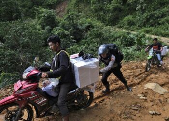 Nearly 205 million eligible voters of Indonesia choose candidates in this Wednesday’s election. Iconic white ballot boxes and ballots have been carried across the world’s largest archipelago by motorcycle, boat and even horse — as well as on foot.