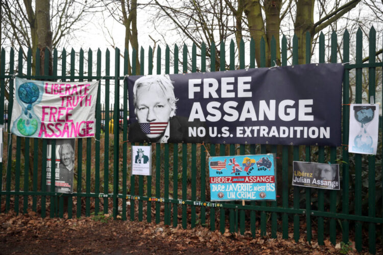 United Kingdom, FEB 24, 2020 : Posters of support hang outside Woolwich Crown Court, ahead of a hearing to decide whether WikiLeaks founder Julian Assange should be extradited to the United States, in London on Monday.