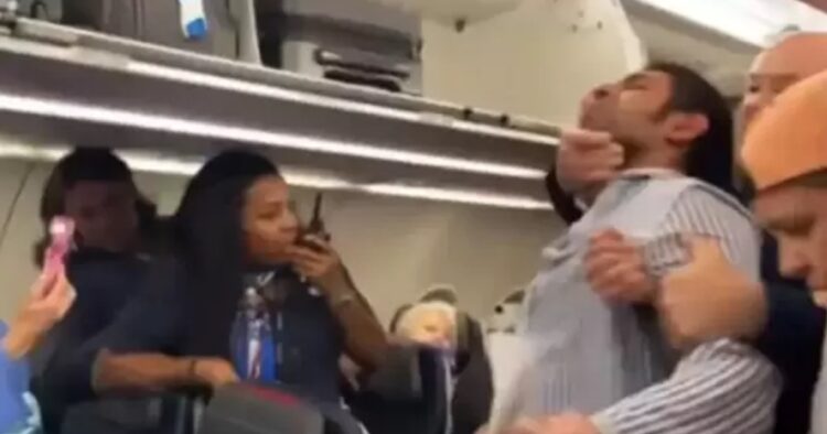 Mid-Air Chaos: American Airlines Passenger Headlocked After Antisemitic Slur at Flight Attendant