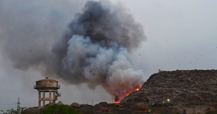 Amid the major fire that broke out at the Ghazipur landfill site in Delhi on Sunday evening, Smoke continues to engulf citizens of Delhi, trapping them in a “gas chamber environment”.