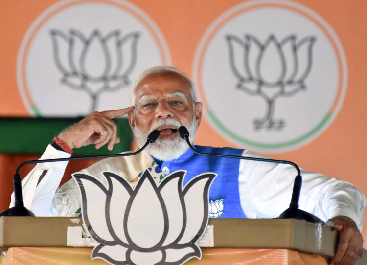 Koderma, May 14: Prime Minister Narendra Modi addresses during a public meeting for the Lok Sabha polls, in Koderma on Tuesday.