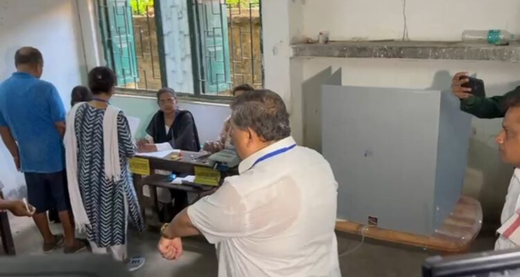 Bharatiya Janata Party (BJP) candidate from Howrah Rathin Chakraborty cast his vote at a polling station in his constituency.