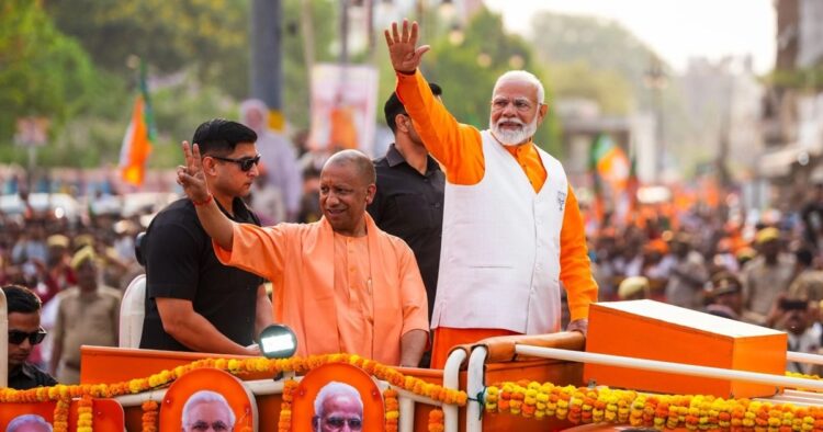Prime Minister Narendra Modi is holding a mega five-kilometre-long roadshow in Varanasi. PM Modi paid floral tribute to Pandit Madan Mohan Malaviya’s statue. Hundreds of BJP workers had gathered on both sides of the road to catch a glimpse of Prime Minister Modi.