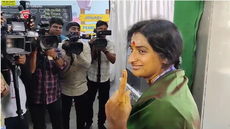 Bharatiya Janata Party's candidate from Hyderabad, Madhavi Latha, cast her vote at the Amrita Vidyalayam polling station in Hyderabad