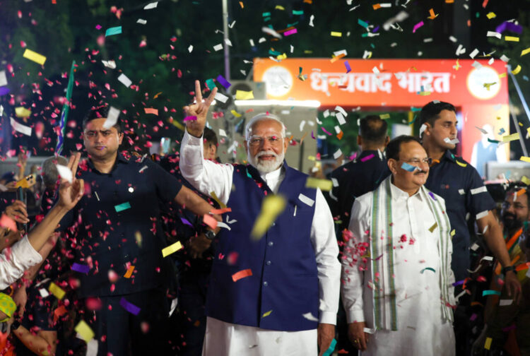 New Delhi, June 04 : Prime Minister Narendra Modi shows victory signs as he arrives at BJP HQ after National Democratic Alliance's (NDA) lead in the Lok Sabha elections 2024, in New Delhi on Tuesday.