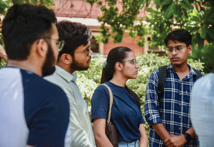 New Delhi, June 13 : Students wait during the Supreme Court hearing on the NEET-UG 2024 exam issue, in New Delhi on Thursday.