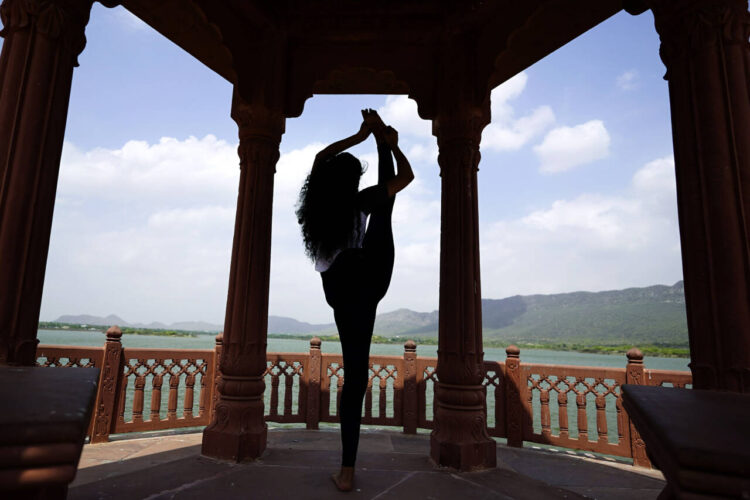 Ajmer, Jun 20: Yoga instructor Tanvi Sharma performs Yoga on the eve of International Yoga Day in Ajmer on Thursday.