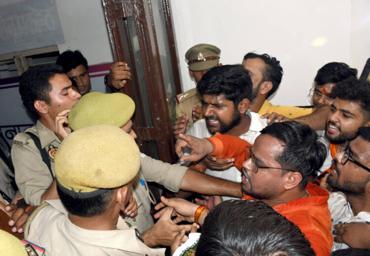 Kanpur, Jun 21 Akhil Bharatiya Vidyarthi Parishad students scuffle with police personnel during their protest over NEET and UGC-NET issues, at DM Office in Kanpur on Friday.