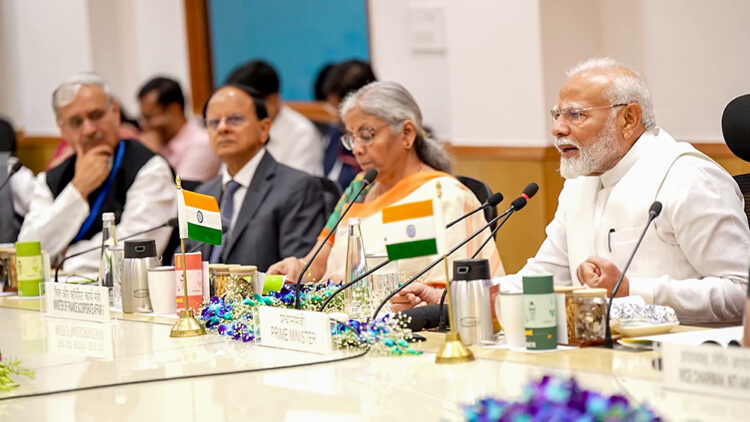 New Delhi, Jul 11 : Prime Minister Narendra Modi addresses a meeting with economists ahead of the Union budget which will be presented on July 23, in New Delhi on Thursday. Union Finance Minister Nirmala Sitharaman is also present.