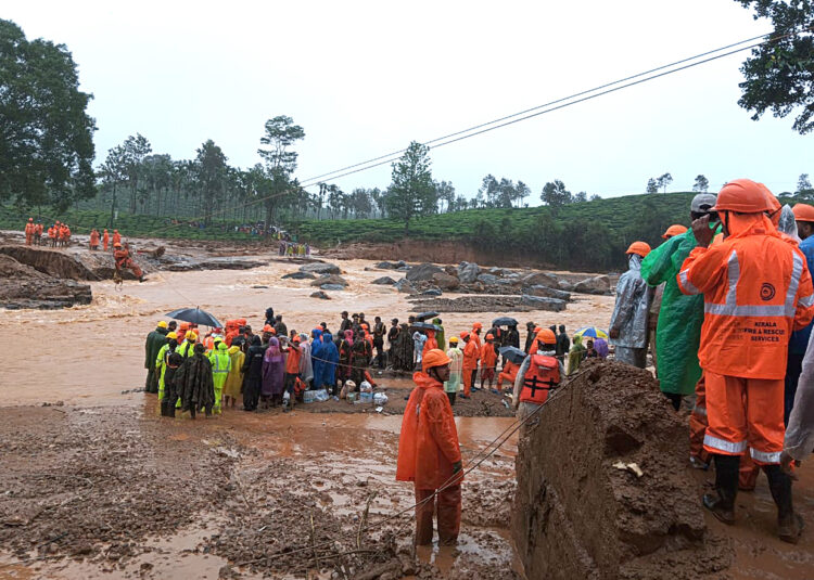 Wayanad, Jul 30: The National Disaster Response Force (NDRF) personnel conduct rescue operation after a devastating landslide hit hilly villages triggered by heavy rainfall, in Wayanad on Tuesday.