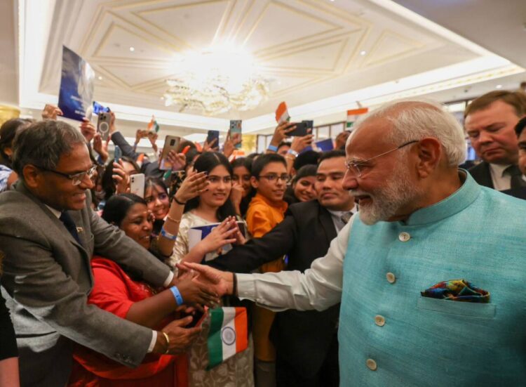 PM Modi interacting with the Indian Diaspora in Russia