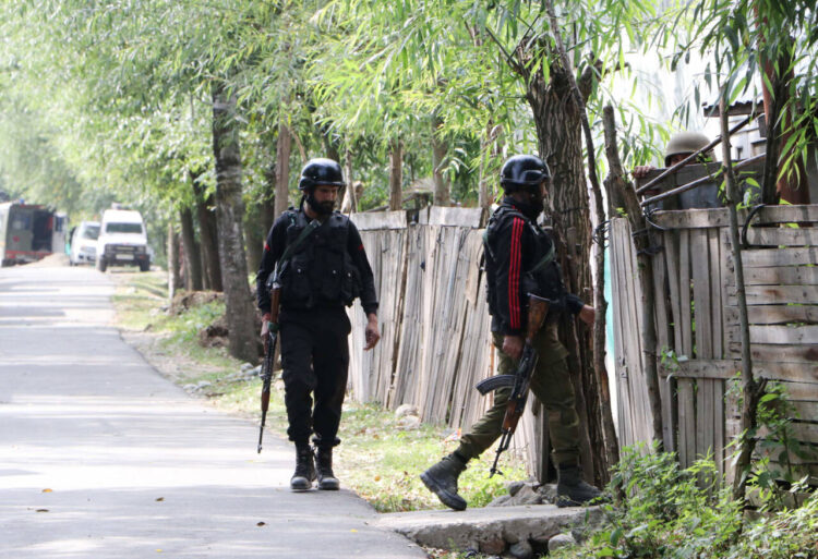 Anantnag, Sept 14 FILE: Security personnel patrol amid an encounter between the security forces and militants, at Kokernag, in Anantnag on Thursday. Two Army officers and a policeman died during the encounter