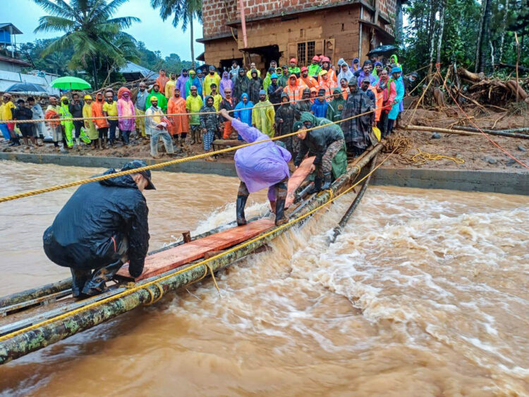 Wayanad, July 31: A temporary bridge is built by Indian Army and NDRF for the ease of providing relief materials and rescuing stranded people from the landslide-affected Wayanad, on Wednesday.