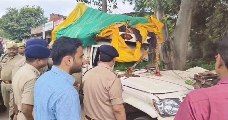 A vehicle full of devotees collided with a truck standing in front near Gulampur town of Saini police station area of ​​the district.