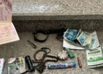 A heavy amount of cash, a UNRWA (United Nations Relief and Works Agency) ID