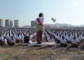 Members of the Rashtriya Swayamsevak Sangh, or RSS, stand at attention and salute a saffron-orange flag at a morning shakha, or drill session, in a park in suburban Mumbai, India.

(Lauren Frayer/NPR)